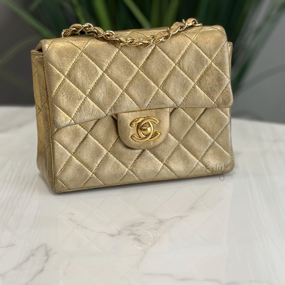 CHANEL Handbags - RARE CHANEL VINTAGE GOLD LAMBSKIN
CLASSIC SQUARE MINI FLAP BAG 24K GOLD PLATED